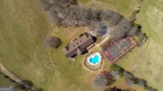 view of a house with a backyard