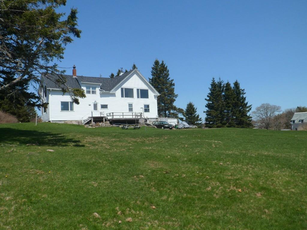 68 Lane's Island Road Vinalhaven, ME 04863 - Photo 6 of 33 South side of house looks out onto...