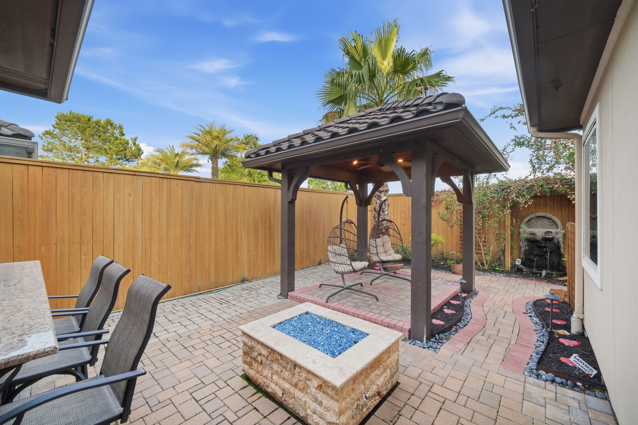 5815 Stratton Woods Drive Spring, TX 77389 - Photo 30 of 45 a view of a chairs and table in the patio