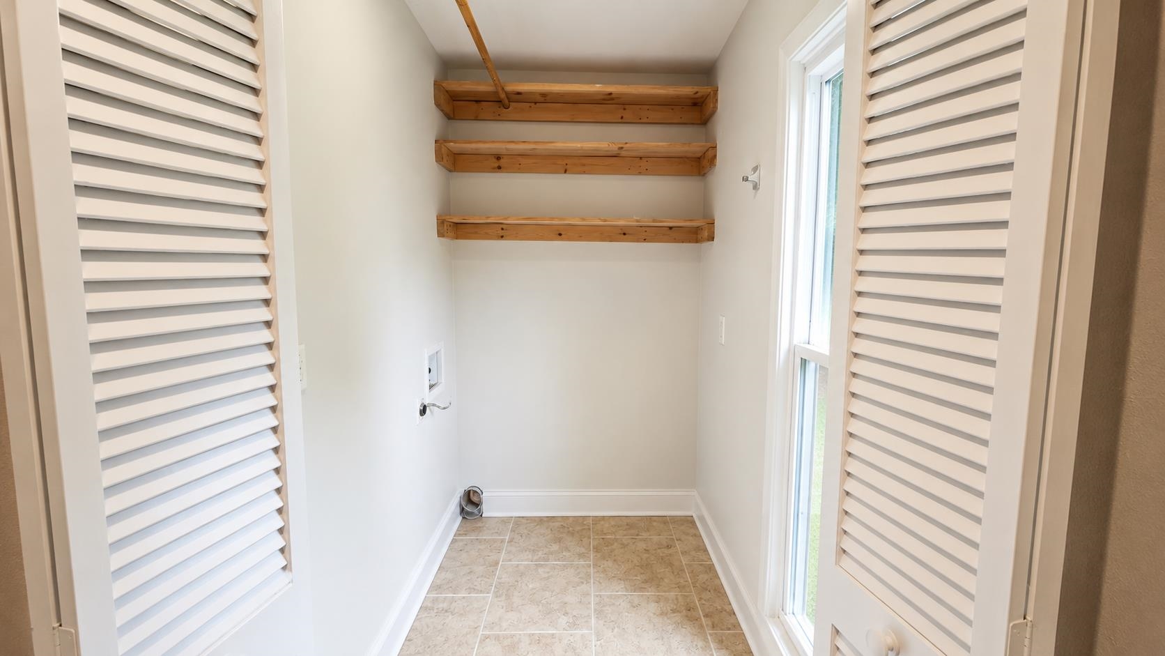89 Ericson Road Memphis, TN 38018 - Photo 14 of 36 a view of a bedroom with a window
