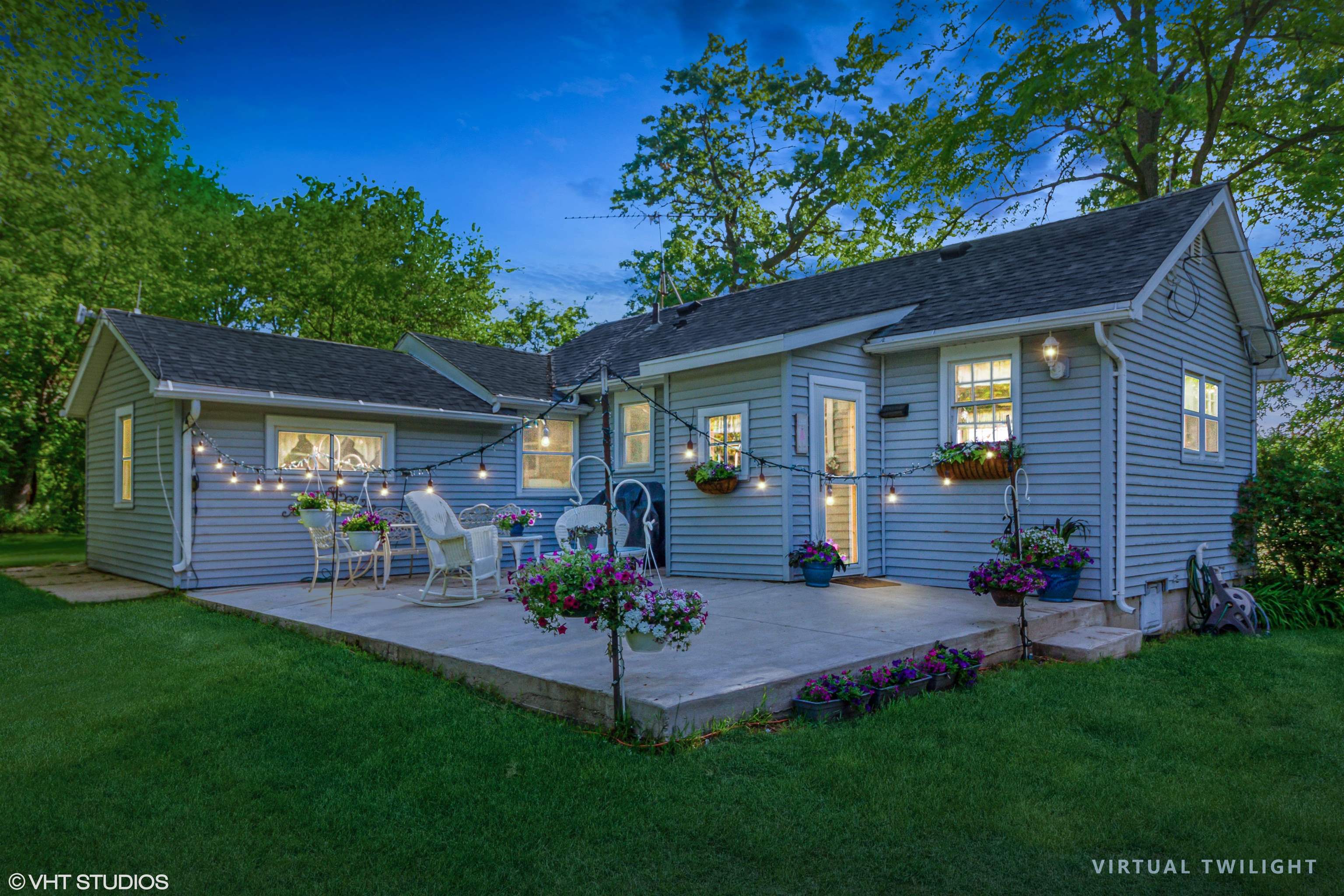 8036 South Avon Store Road Brodhead, WI 53520 - Photo 1 of 20 a view of a house with a yard porch and sitting area