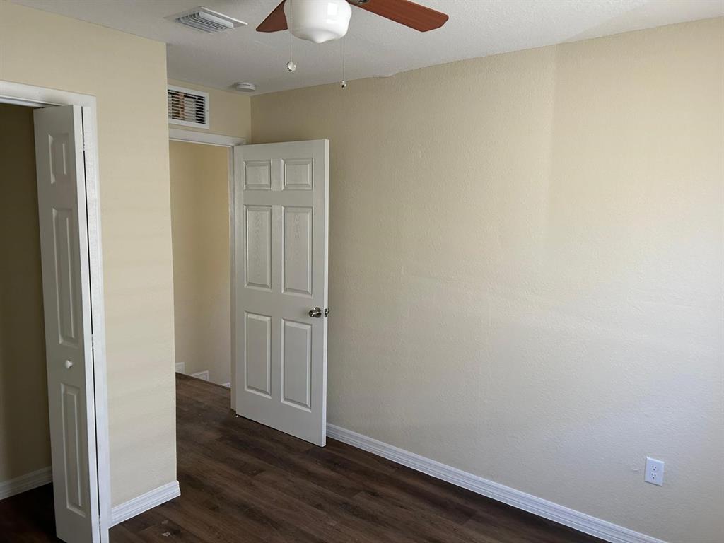 371 Banyan Avenue Pahokee, FL 33476 - Photo 16 of 17 wooden floor in an empty room