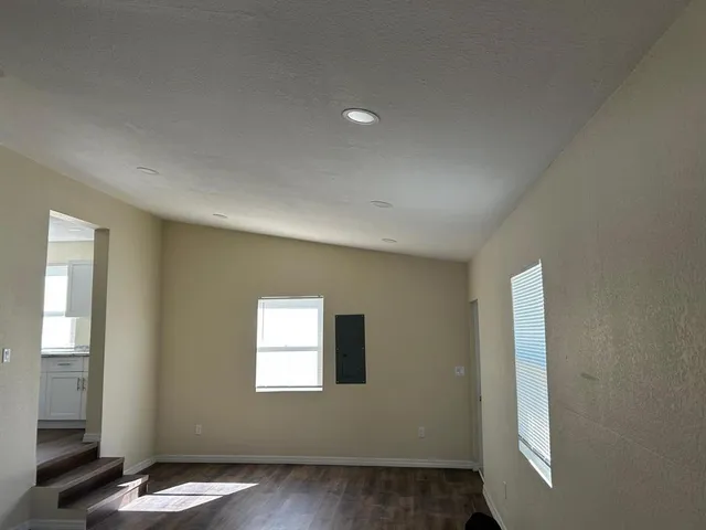 an empty room with windows