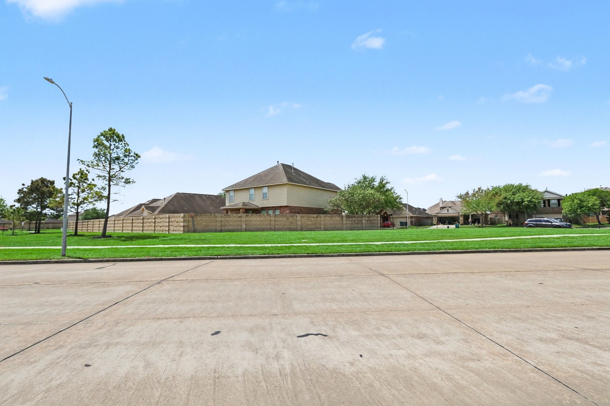 9719 Opal Rock Drive Rosharon, TX 77583 - Photo 30 of 33 View from the street behind the house