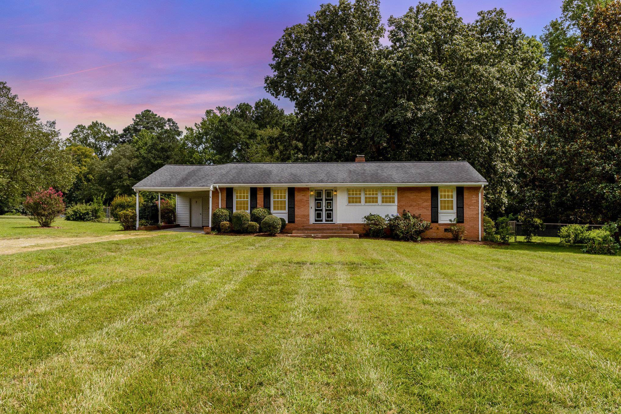 4800 Kyle Drive Raleigh, NC 27616 - Photo 1 of 36 a front view of a house with a yard
