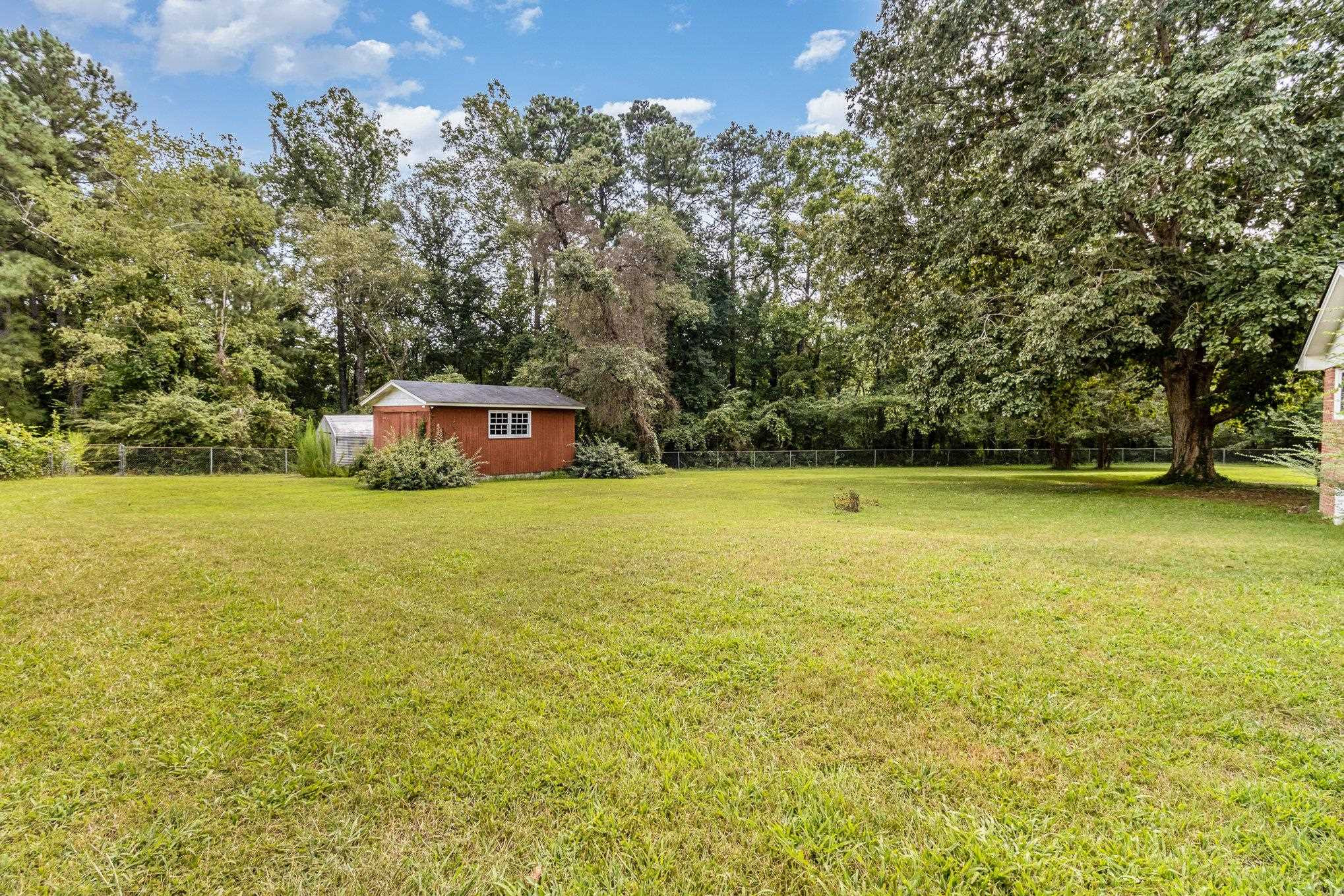 4800 Kyle Drive Raleigh, NC 27616 - Photo 13 of 36 a view of a lake with a yard