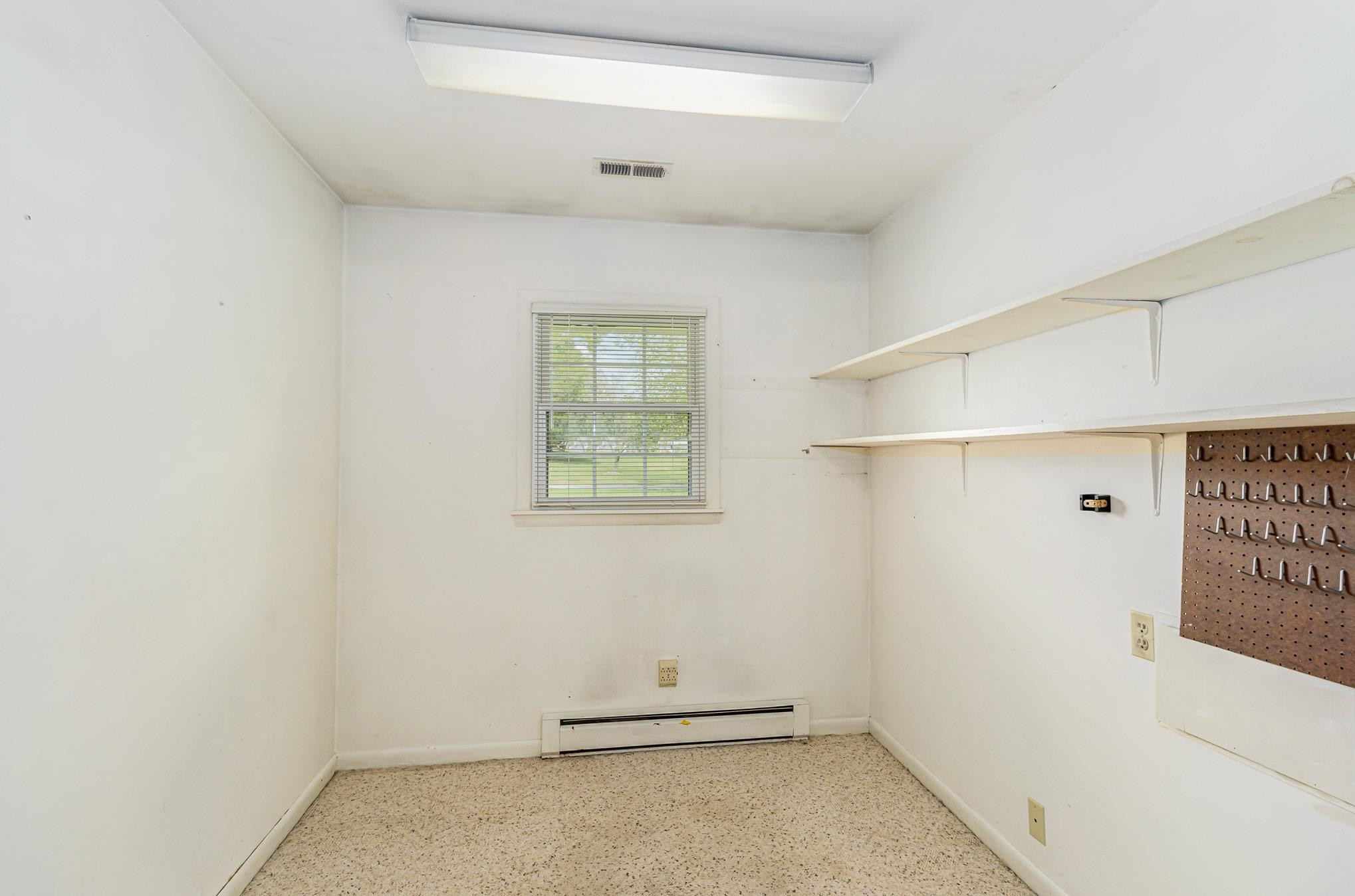 4800 Kyle Drive Raleigh, NC 27616 - Photo 21 of 36 an empty room with windows
