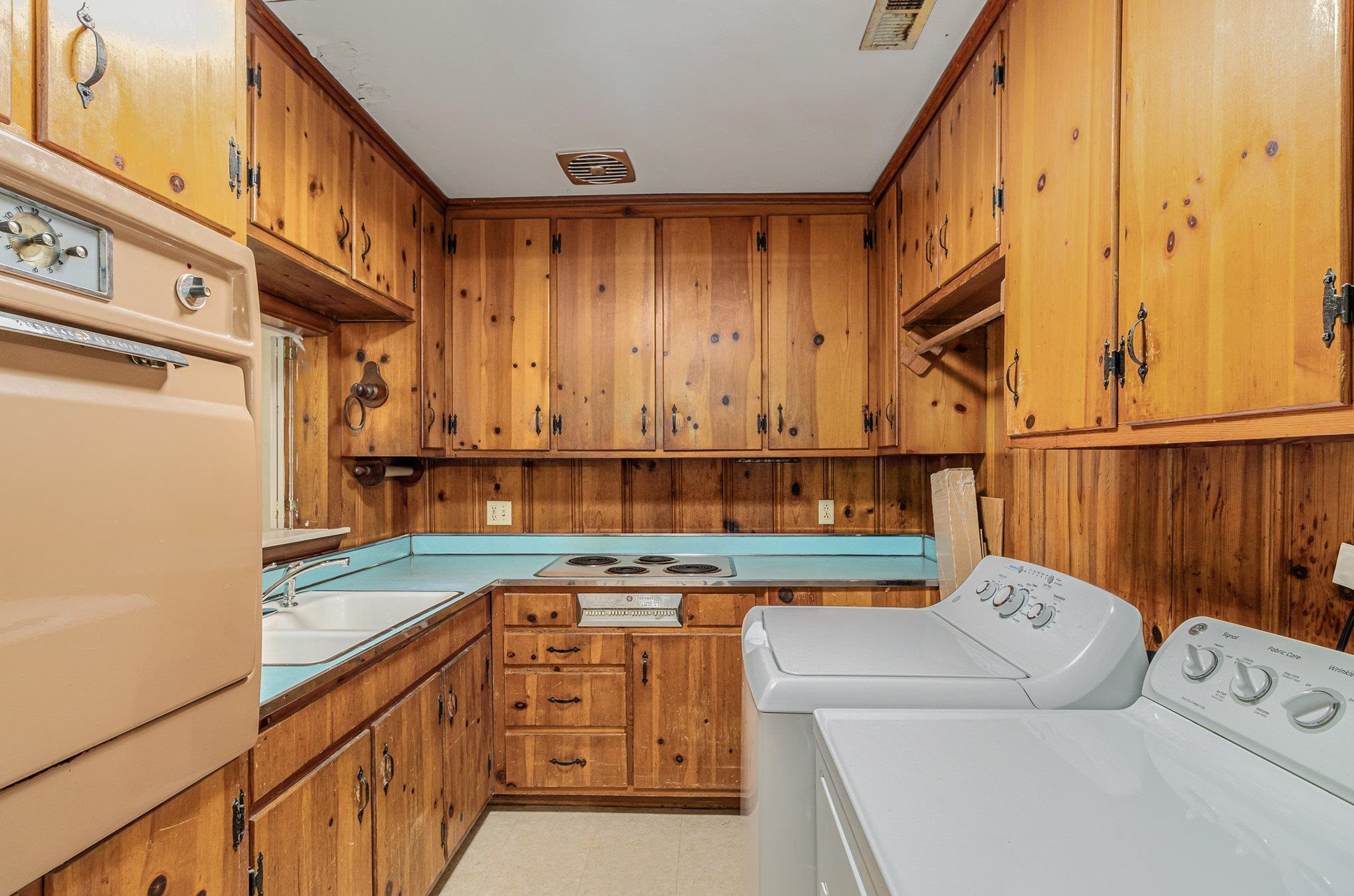 4800 Kyle Drive Raleigh, NC 27616 - Photo 22 of 36 a kitchen with a cabinets and window