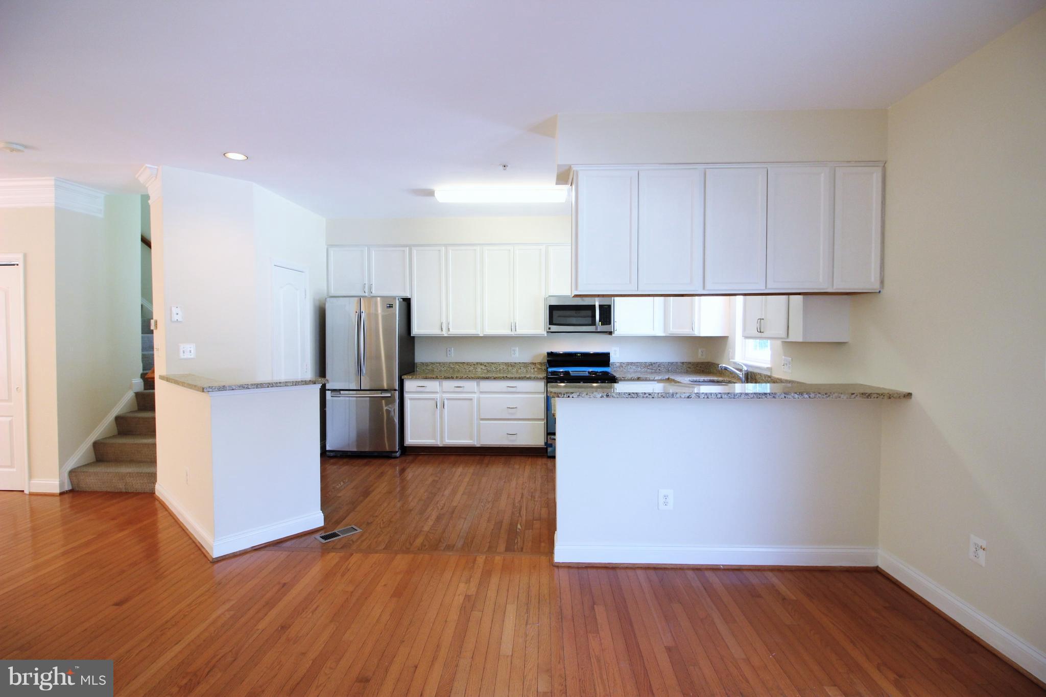 23612 Public House Road Clarksburg, MD 20871 - Photo 7 of 30 Kitchen - Granite & New SS Appliances