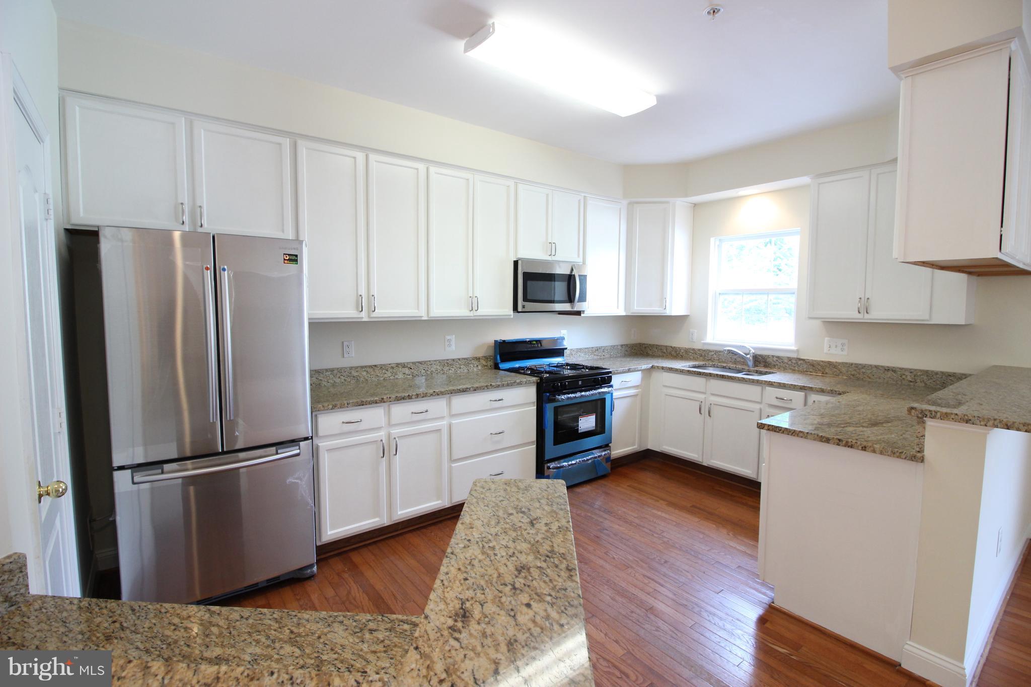 23612 Public House Road Clarksburg, MD 20871 - Photo 8 of 30 Kitchen - Granite & New SS Appliances
