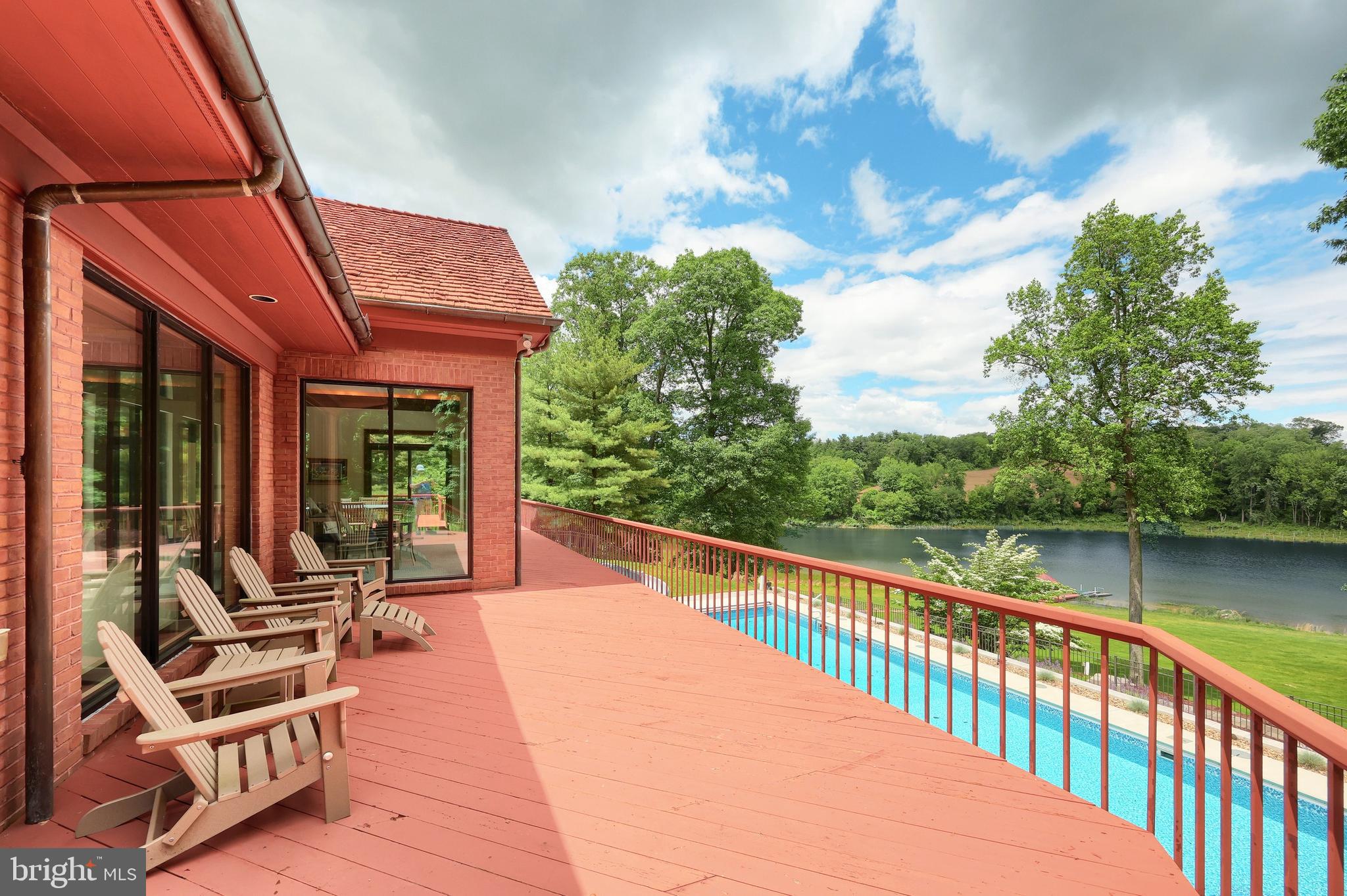 174 Springhouse Lane Spring Grove, PA 17362 - Photo 22 of 95 a view of a patio with chairs next to a yard