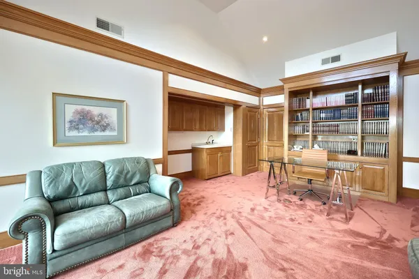 a living room with furniture and window
