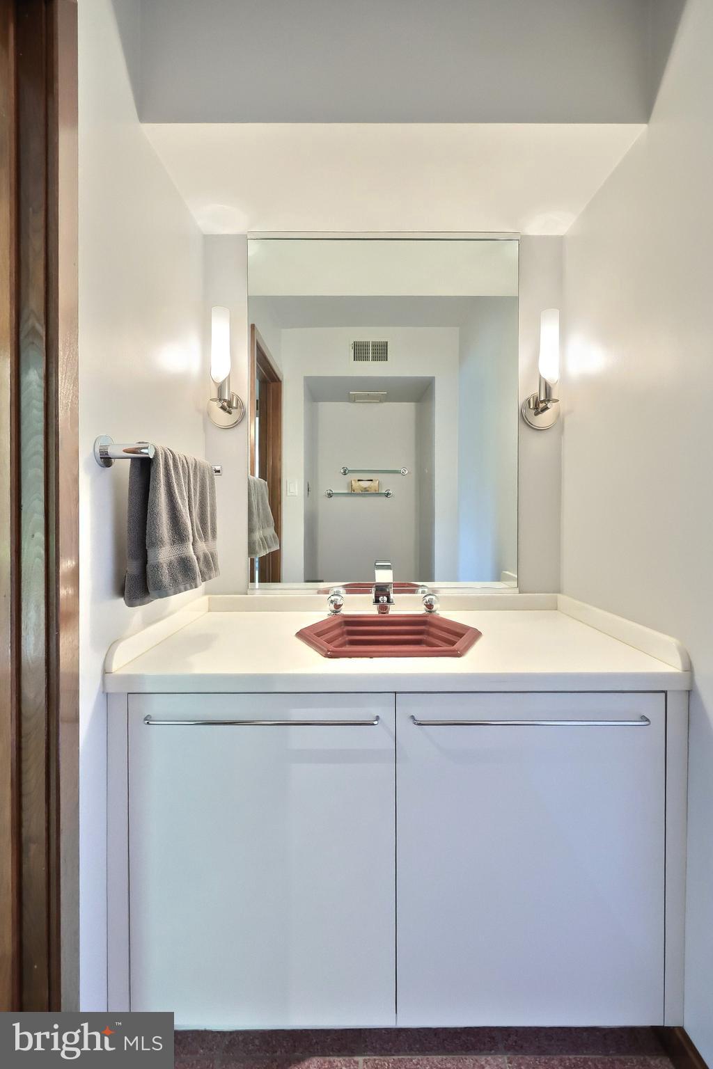 174 Springhouse Lane Spring Grove, PA 17362 - Photo 47 of 95 a bathroom with a sink and a mirror