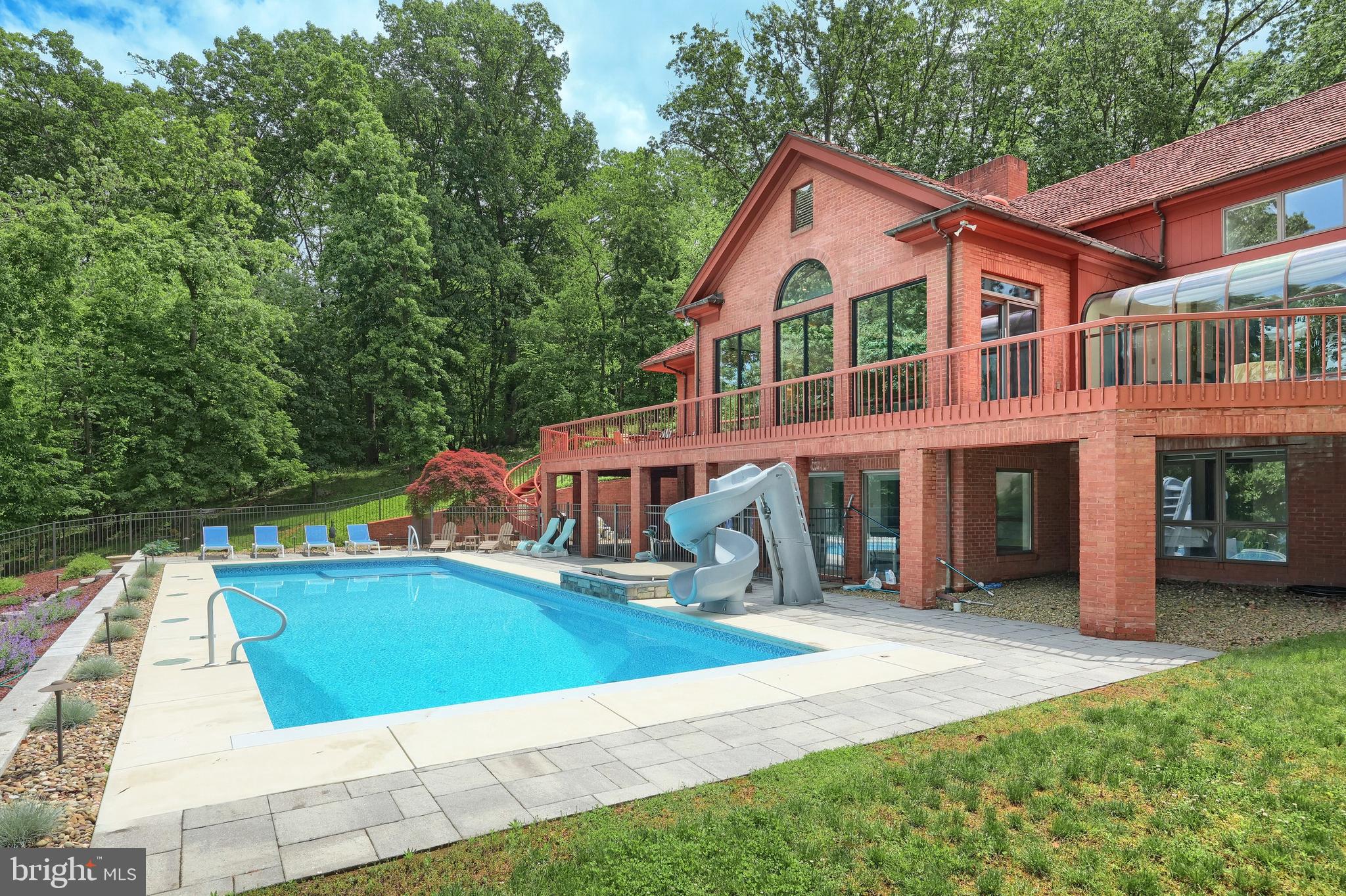 174 Springhouse Lane Spring Grove, PA 17362 - Photo 5 of 95 a front view of a house with a yard and trees