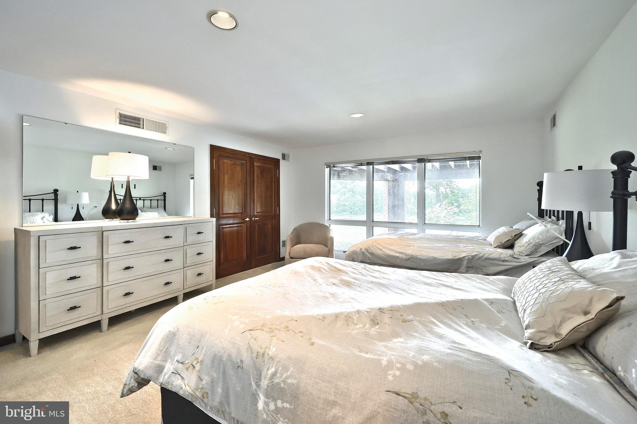 174 Springhouse Lane Spring Grove, PA 17362 - Photo 74 of 95 a bedroom with a large bed and a dresser