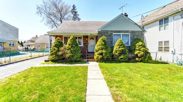 a view of a house with garden