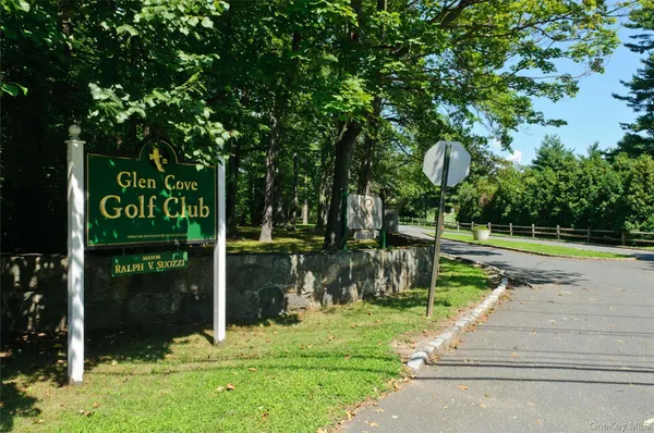 a view of a park with welcome board