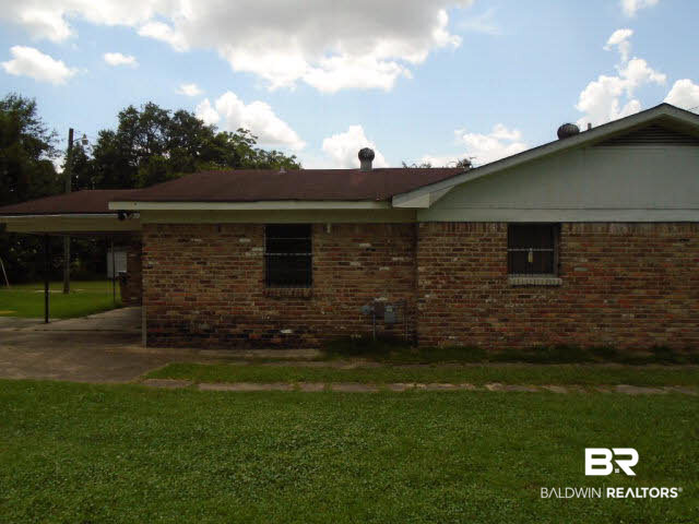 1515 Dominick Street Mobile, AL 36605 - Photo 11 of 13 Side View Patio