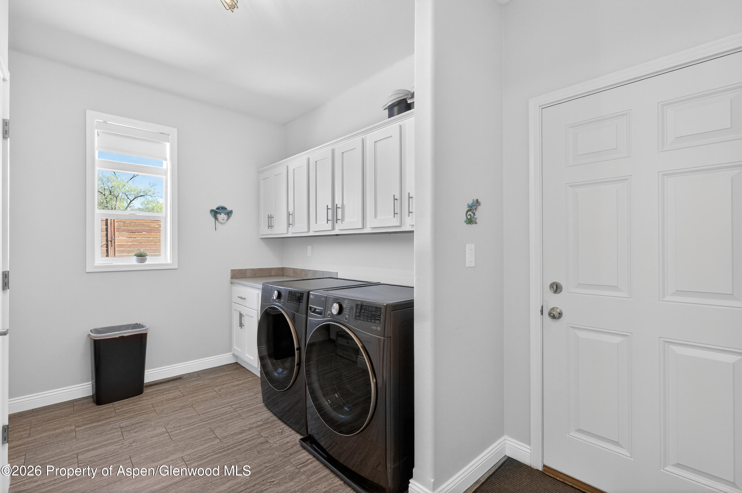 19 County Road 301 Parachute, CO 81635 - Photo 24 of 35 a utility room with closet dryer and washer