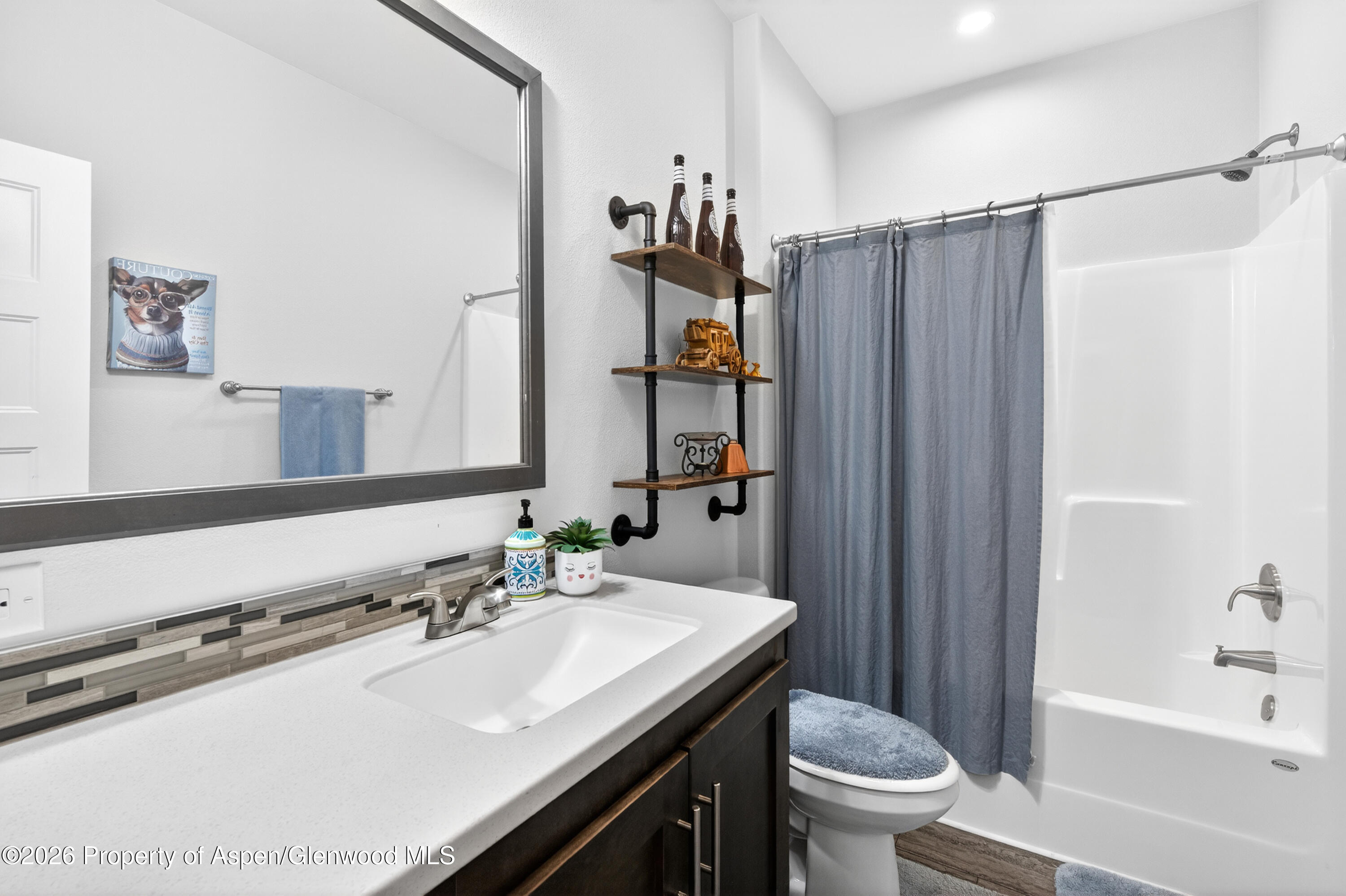 19 County Road 301 Parachute, CO 81635 - Photo 27 of 35 a bathroom with a sink toilet and shower