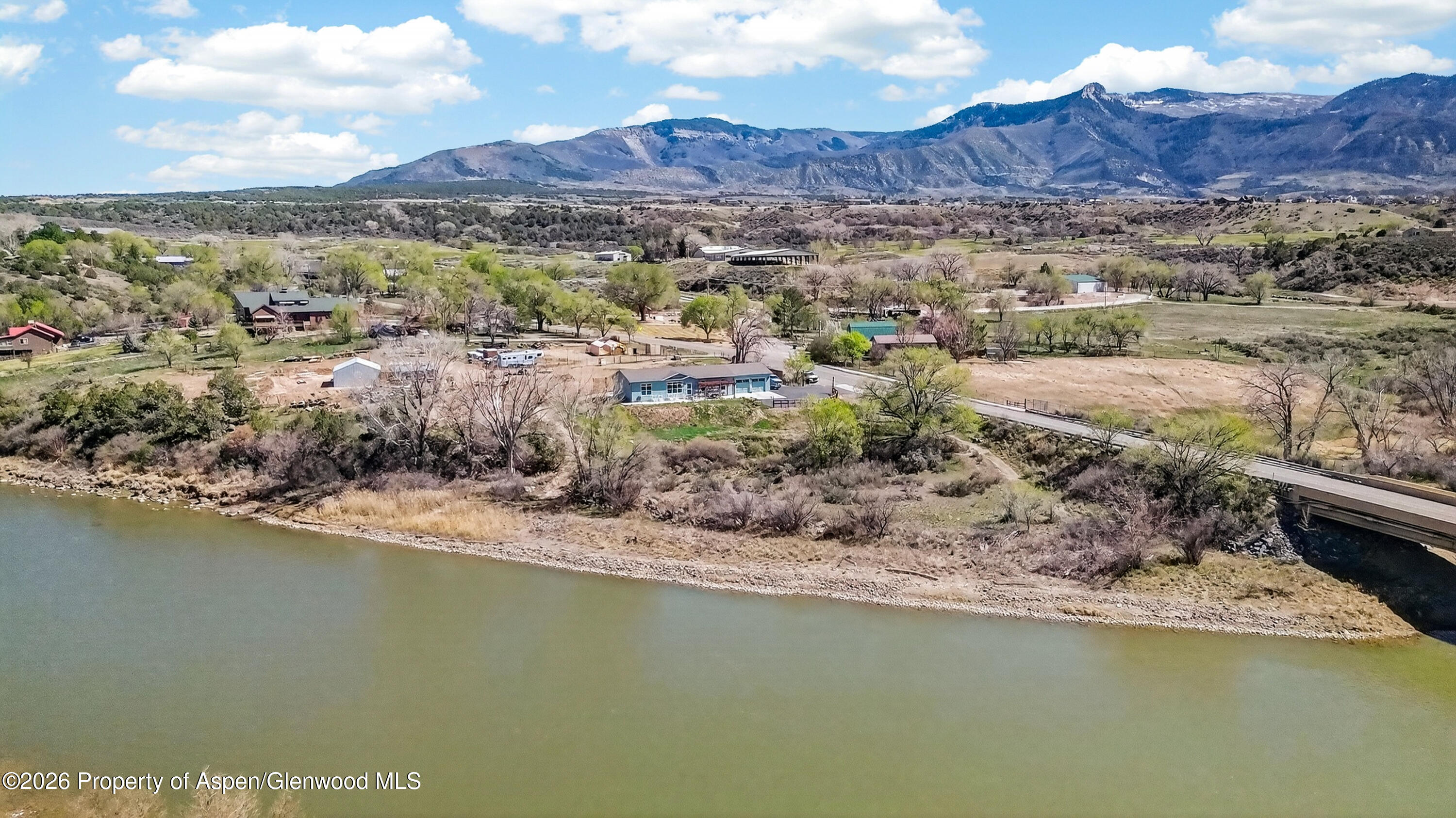 19 County Road 301 Parachute, CO 81635 - Photo 5 of 35 a view of a house with a lake view