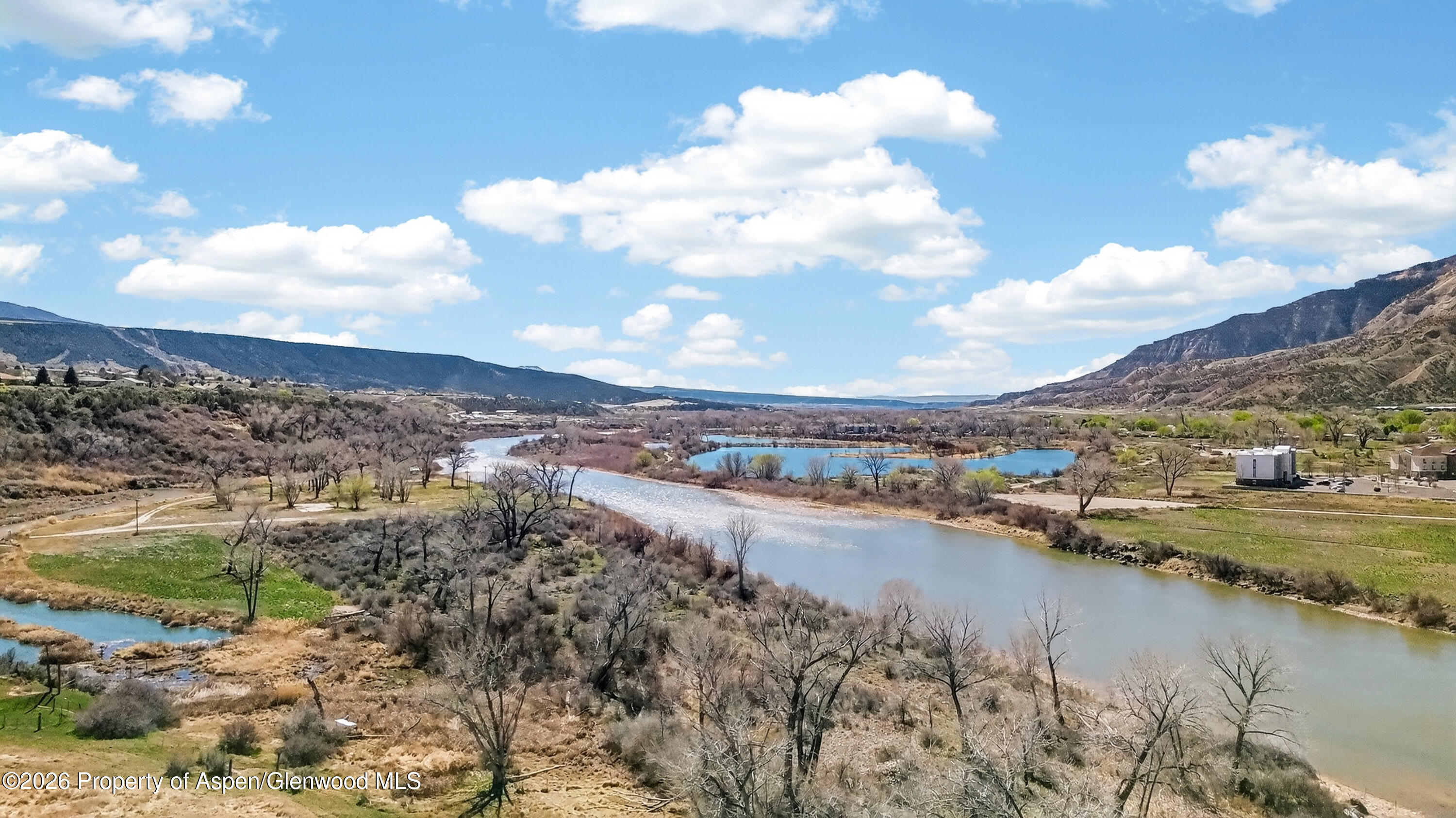 19 County Road 301 Parachute, CO 81635 - Photo 6 of 35 a view of a lake with a city