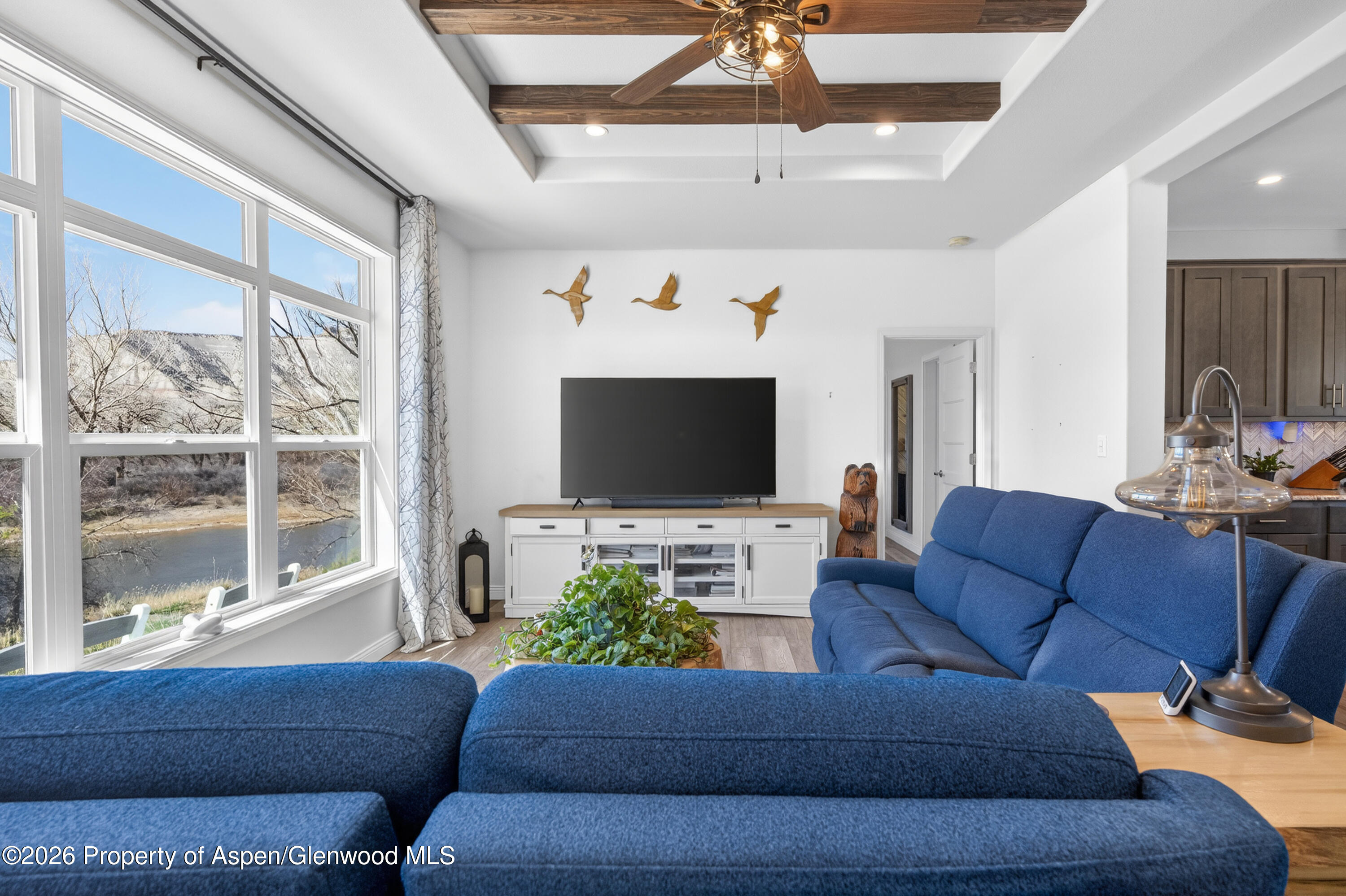 19 County Road 301 Parachute, CO 81635 - Photo 9 of 35 a living room with furniture and a flat screen tv