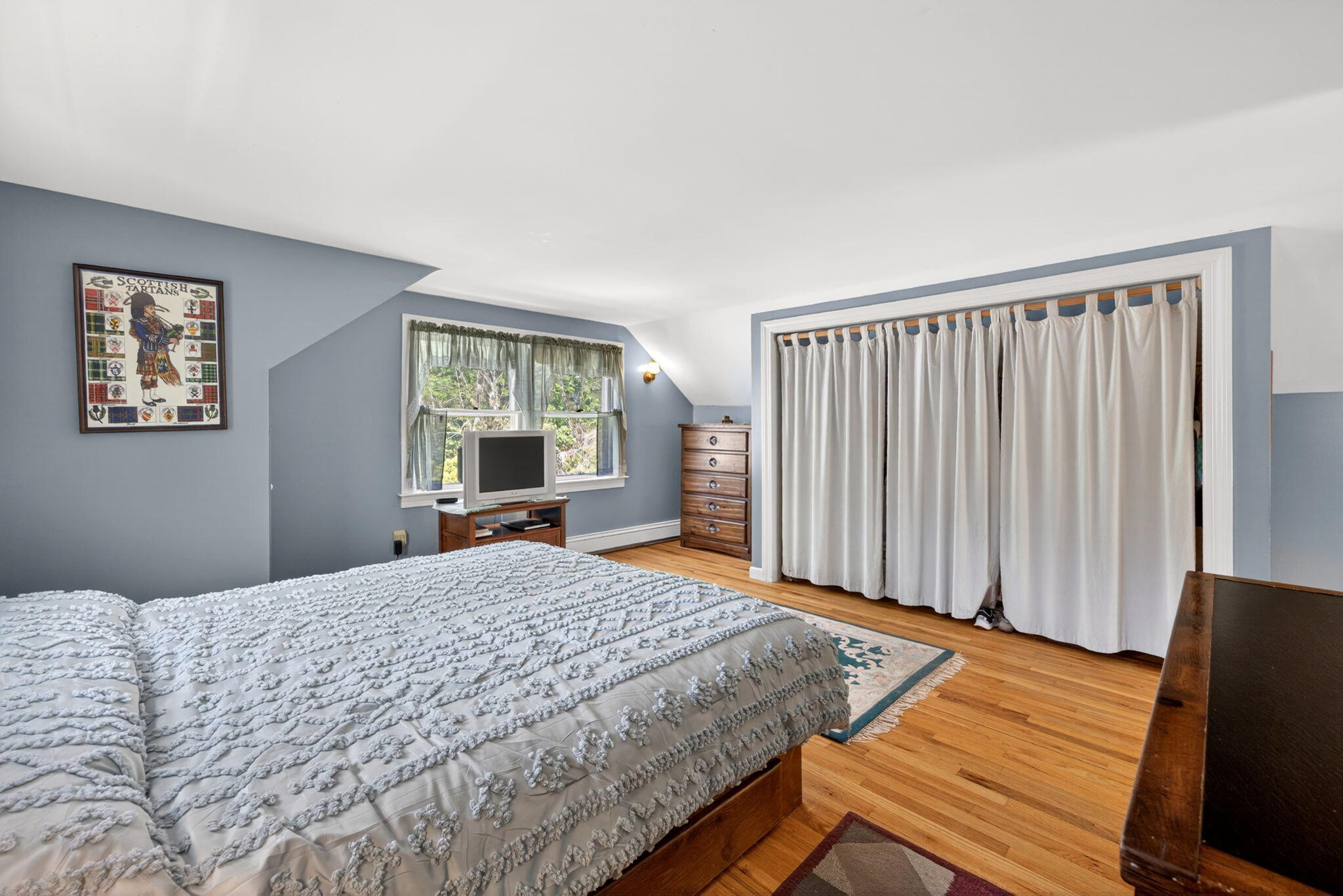 23 Nickerson Road Orleans, MA 02653 - Photo 21 of 54 a bedroom with a bed and window