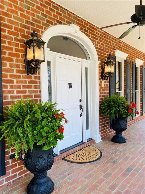 150 Jd Essick Road Lexington, NC 27295 - Photo 1 of 49 Stately and spacious rocking chair front porch, perfect for relaxing all hours of the day
