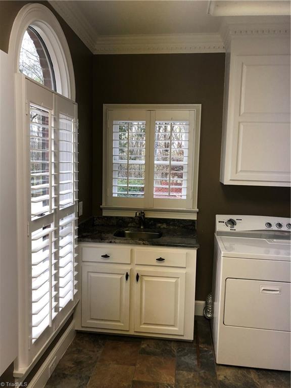 150 Jd Essick Road Lexington, NC 27295 - Photo 23 of 49 Bright and cheery laundry room is located off of kitchen
