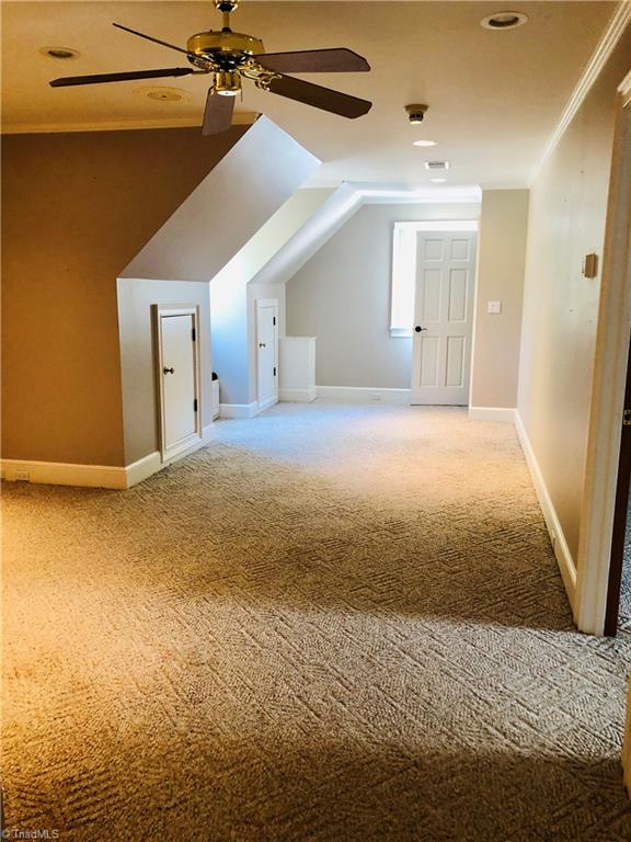 150 Jd Essick Road Lexington, NC 27295 - Photo 28 of 49 Open yet cozy living area upstairs...perfect place for teens or guests to enjoy relaxing, studying, etc. Tons of storage upstairs and throughout the home
