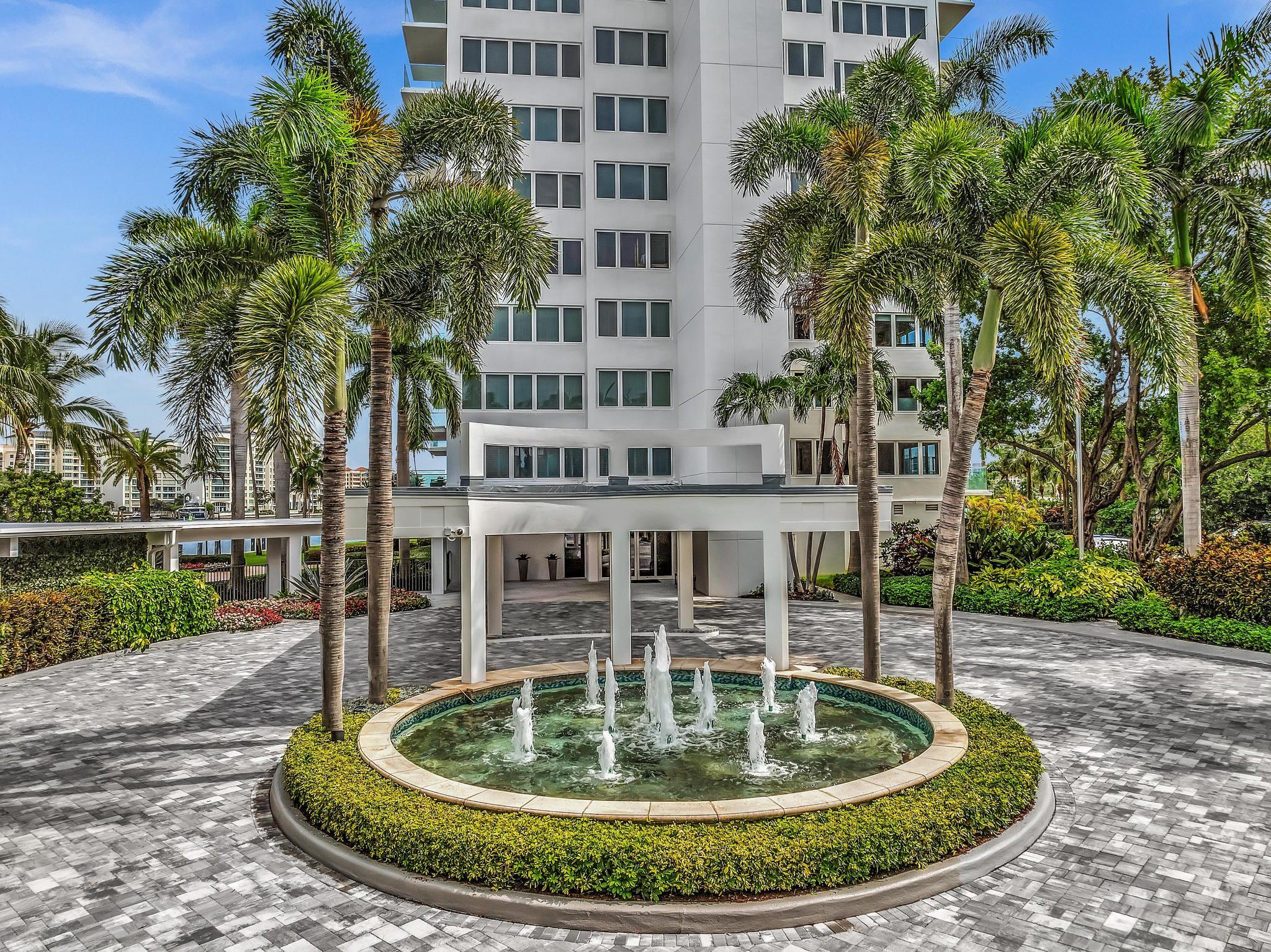 701 East Camino Real, Unit 12G Boca Raton, FL 33432 - Photo 44 of 82 a view of a swimming pool with a house