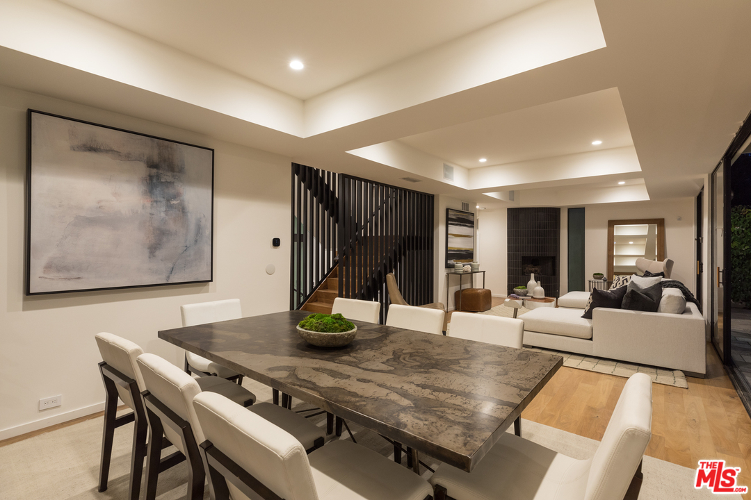 640 East Channel Road Santa Monica, CA 90402 - Photo 38 of 45 a living room with a table and chairs