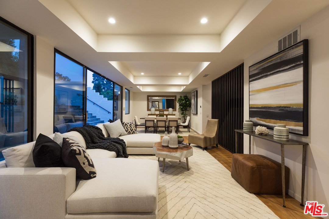 640 East Channel Road Santa Monica, CA 90402 - Photo 39 of 45 a living room with furniture and a flat screen tv