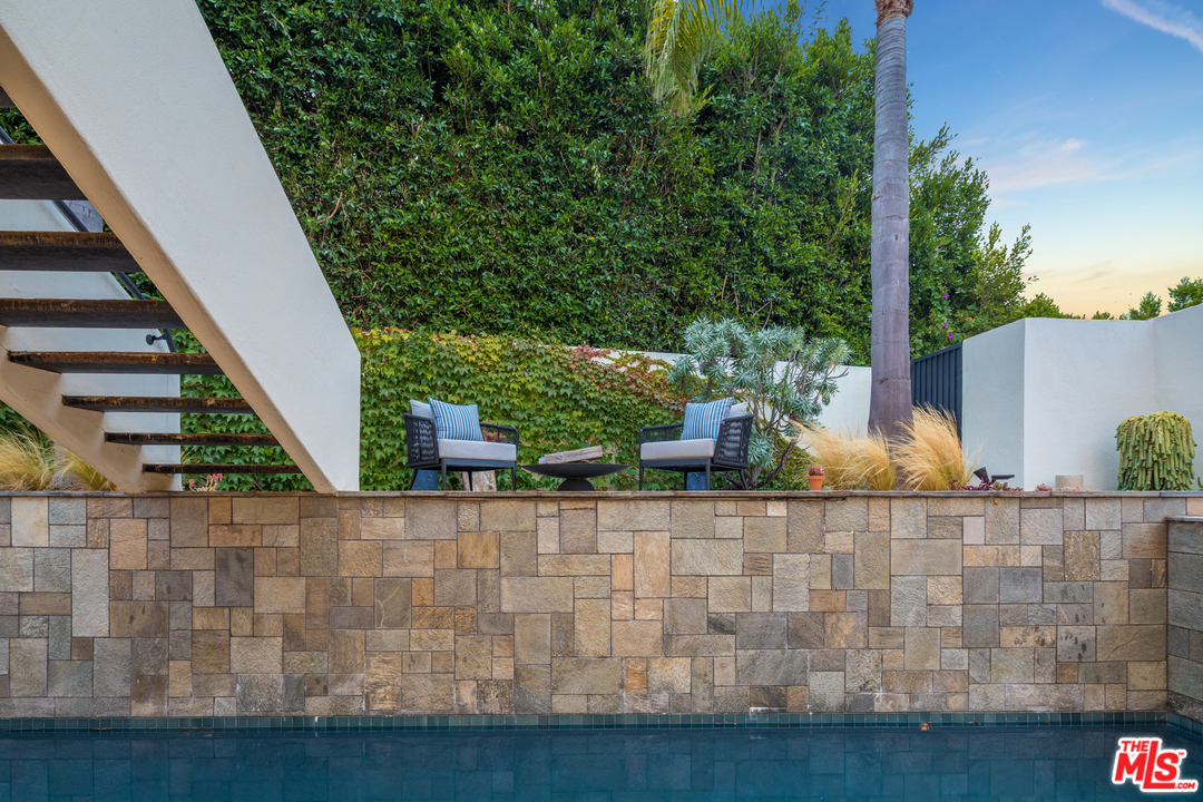 640 East Channel Road Santa Monica, CA 90402 - Photo 41 of 45 a backyard of a house with lots of green space