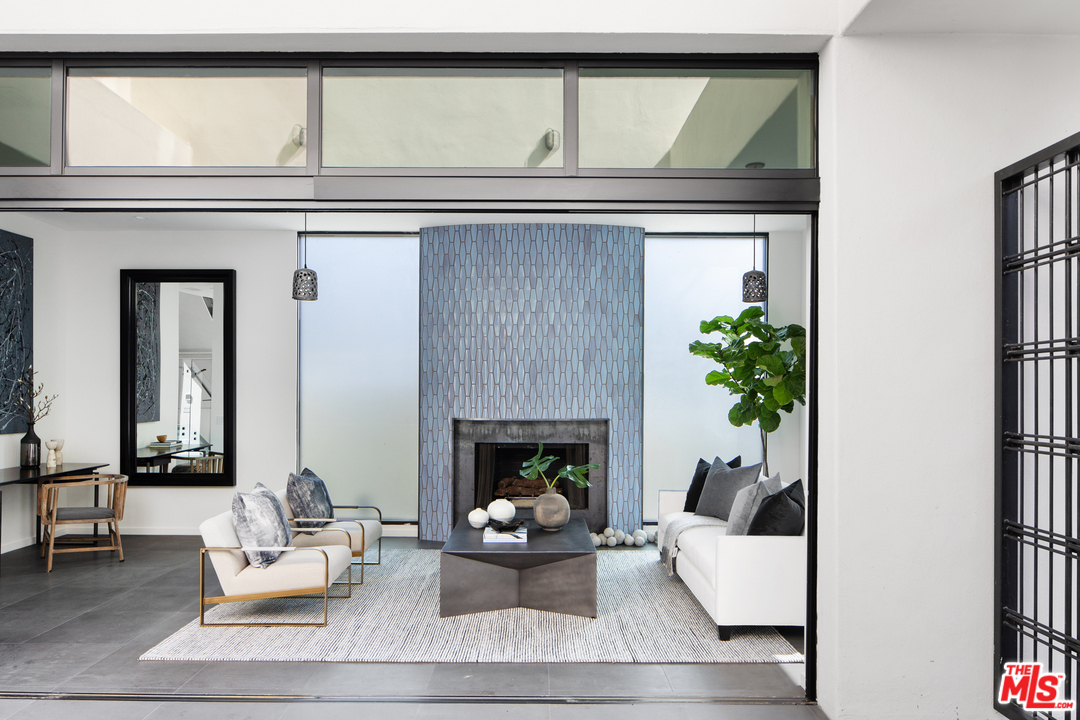 640 East Channel Road Santa Monica, CA 90402 - Photo 7 of 45 a living room with furniture and a fireplace