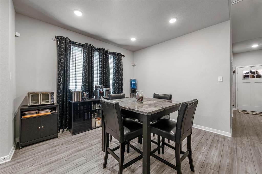 3525 Beutel Road Lorena, TX 76655 - Photo 3 of 34 a view of a dining room with furniture window and wooden floor