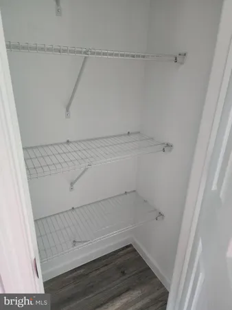 a view of small space with racks on the wall