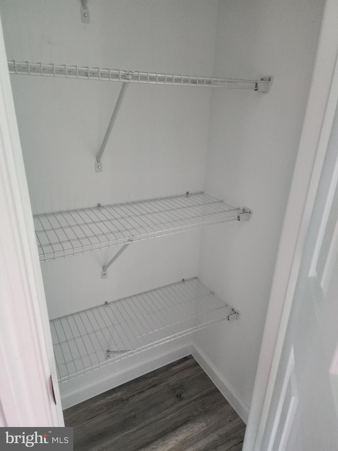 407 Mellon Street Southeast, Unit 3 Washington, DC 20032 - Photo 6 of 7 a view of small space with racks on the wall