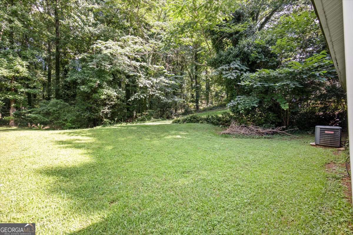 5426 Martins Crossing Road Stone Mountain, GA 30088 - Photo 26 of 26 a view of a backyard