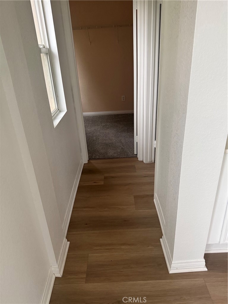 4420 Kristen Court Riverside, CA 92501 - Photo 27 of 39 ENTRY HALLWAY IN BATHROOM TO TOILET AND WALK IN CLOSET