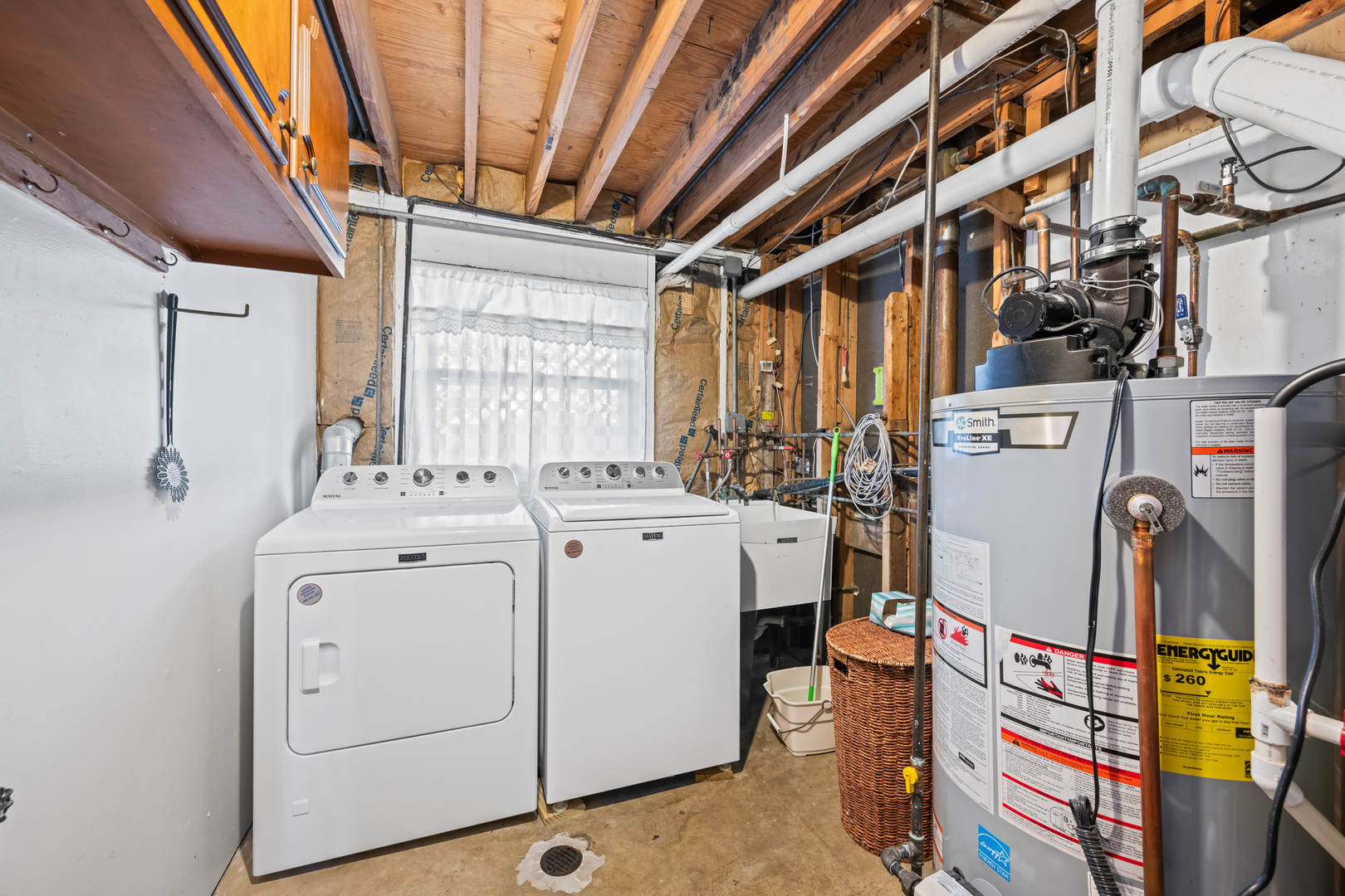 496 Raupp Boulevard Buffalo Grove, IL 60089 - Photo 14 of 19 a utility room with dryer and washer