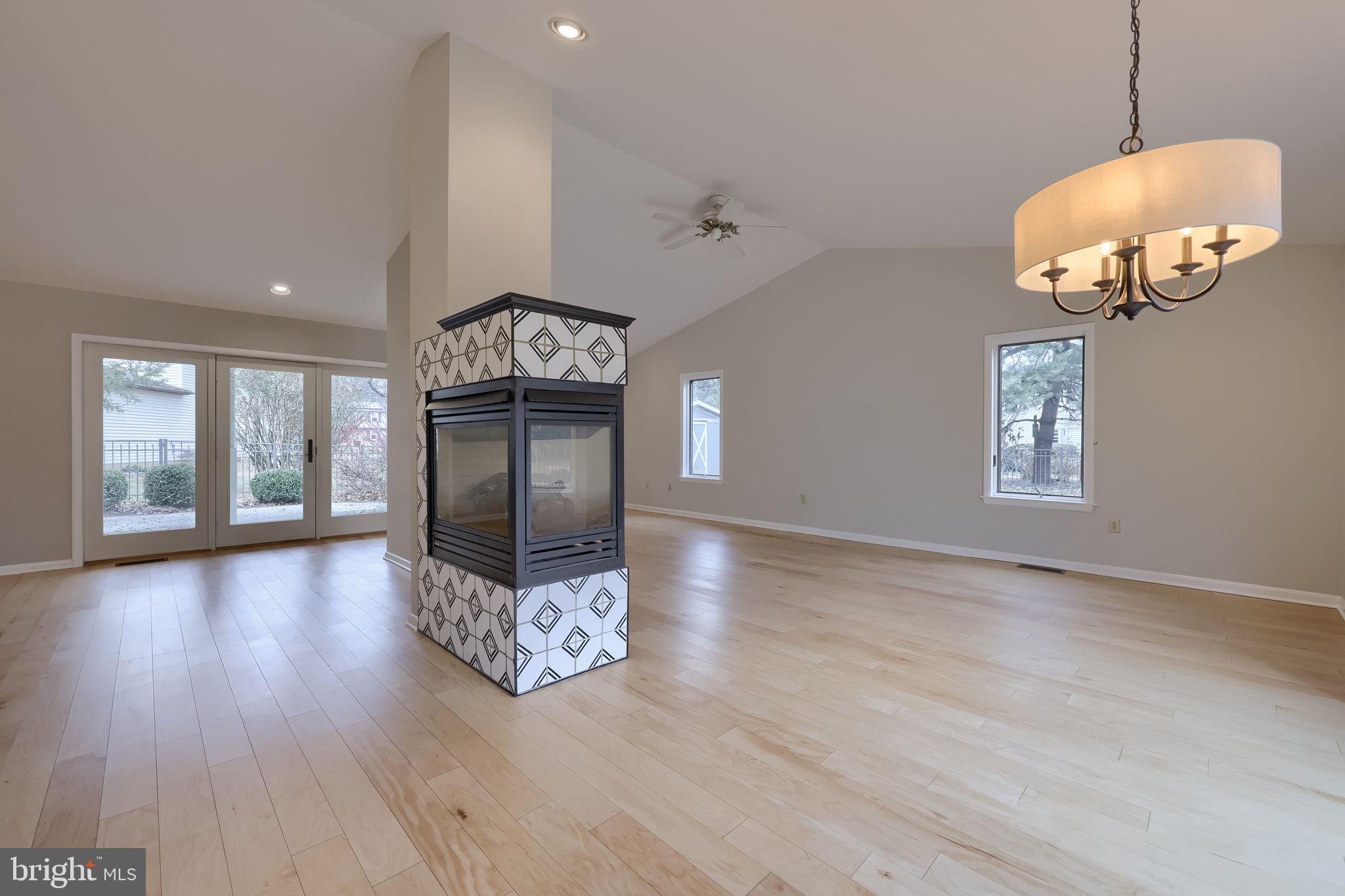 421 Longmeadow Road Lancaster, PA 17601 - Photo 11 of 44 an empty room with wooden floor and windows