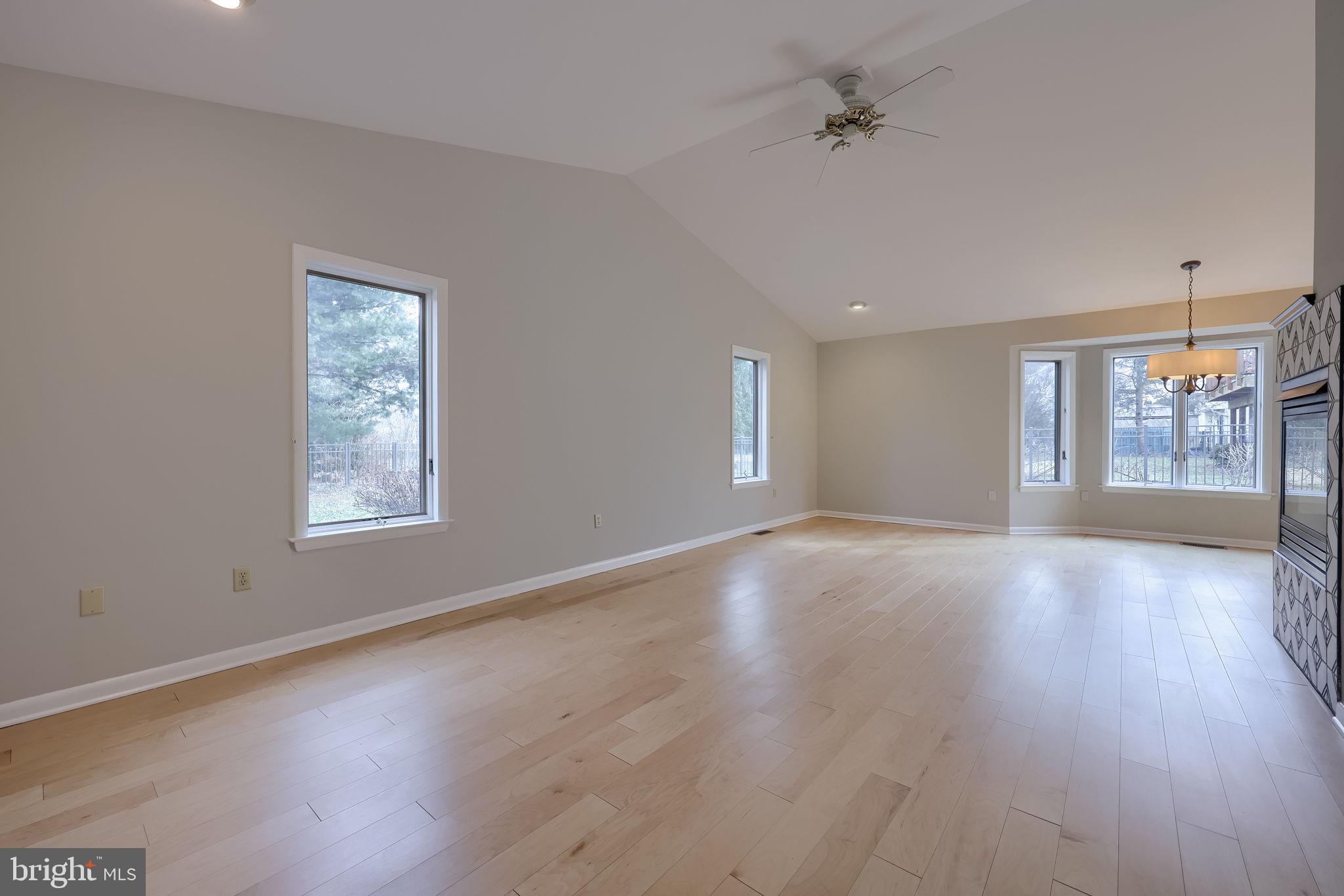 421 Longmeadow Road Lancaster, PA 17601 - Photo 16 of 44 an empty room with wooden floor and windows