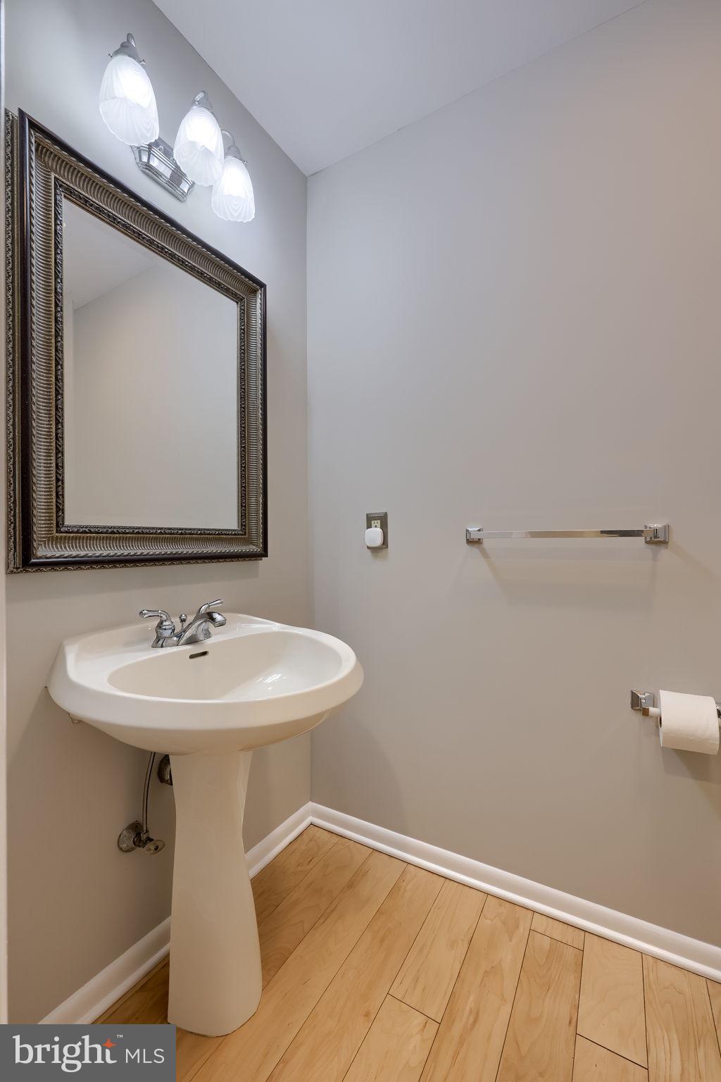 421 Longmeadow Road Lancaster, PA 17601 - Photo 17 of 44 a bathroom with a sink and a mirror