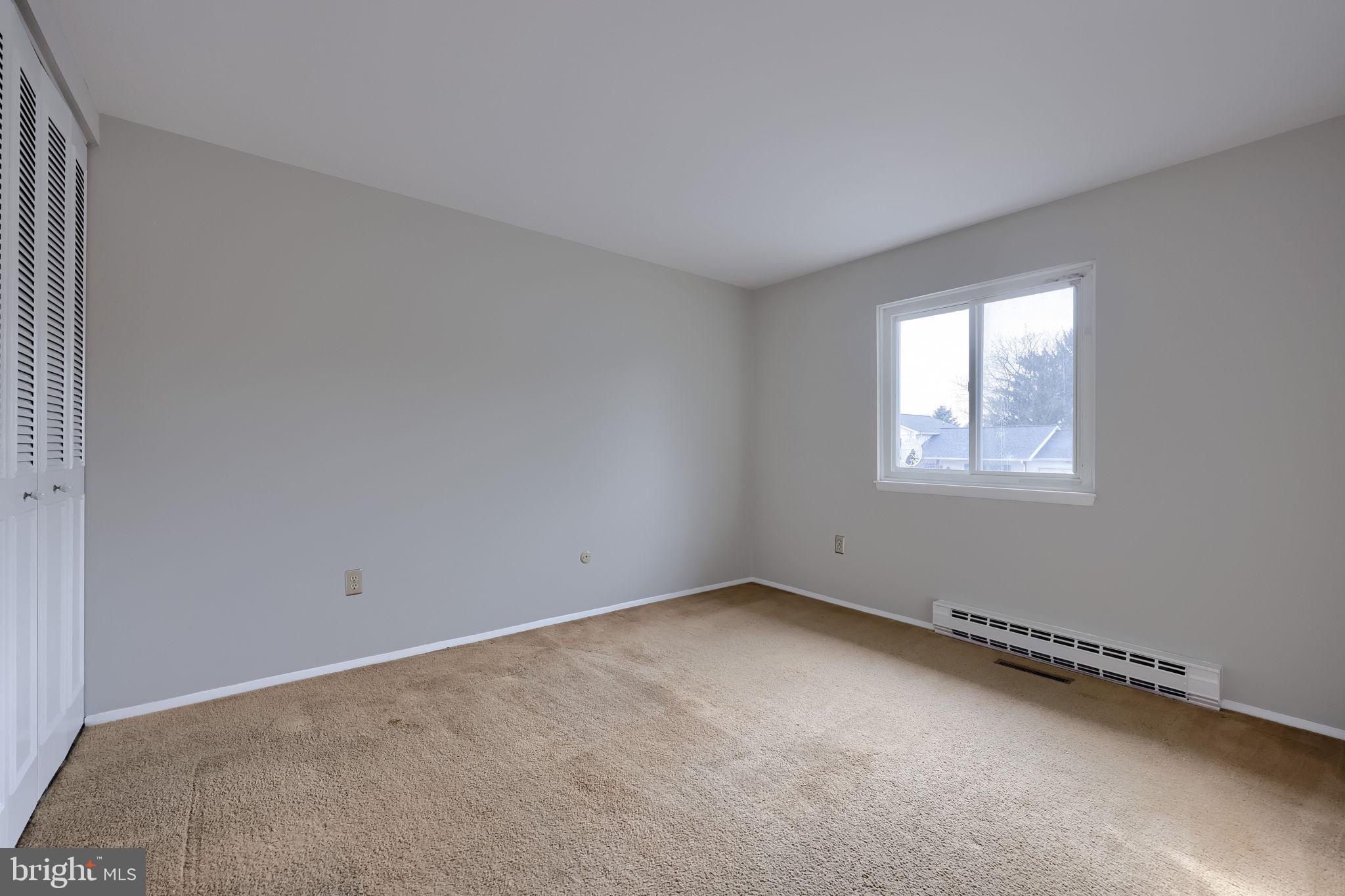 421 Longmeadow Road Lancaster, PA 17601 - Photo 26 of 44 an empty room with a window