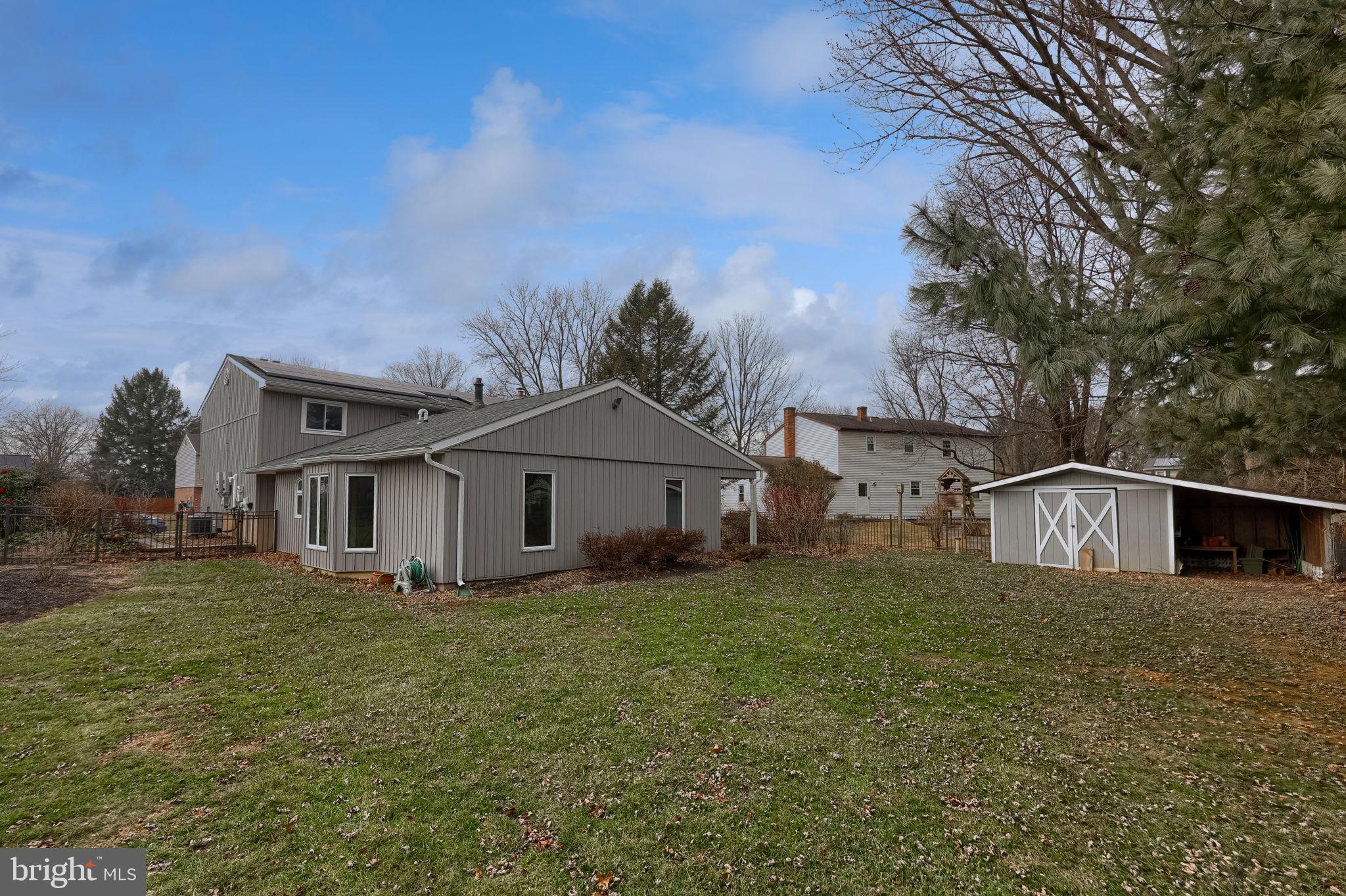 421 Longmeadow Road Lancaster, PA 17601 - Photo 37 of 44 a view of a yard in front of a house with large tree