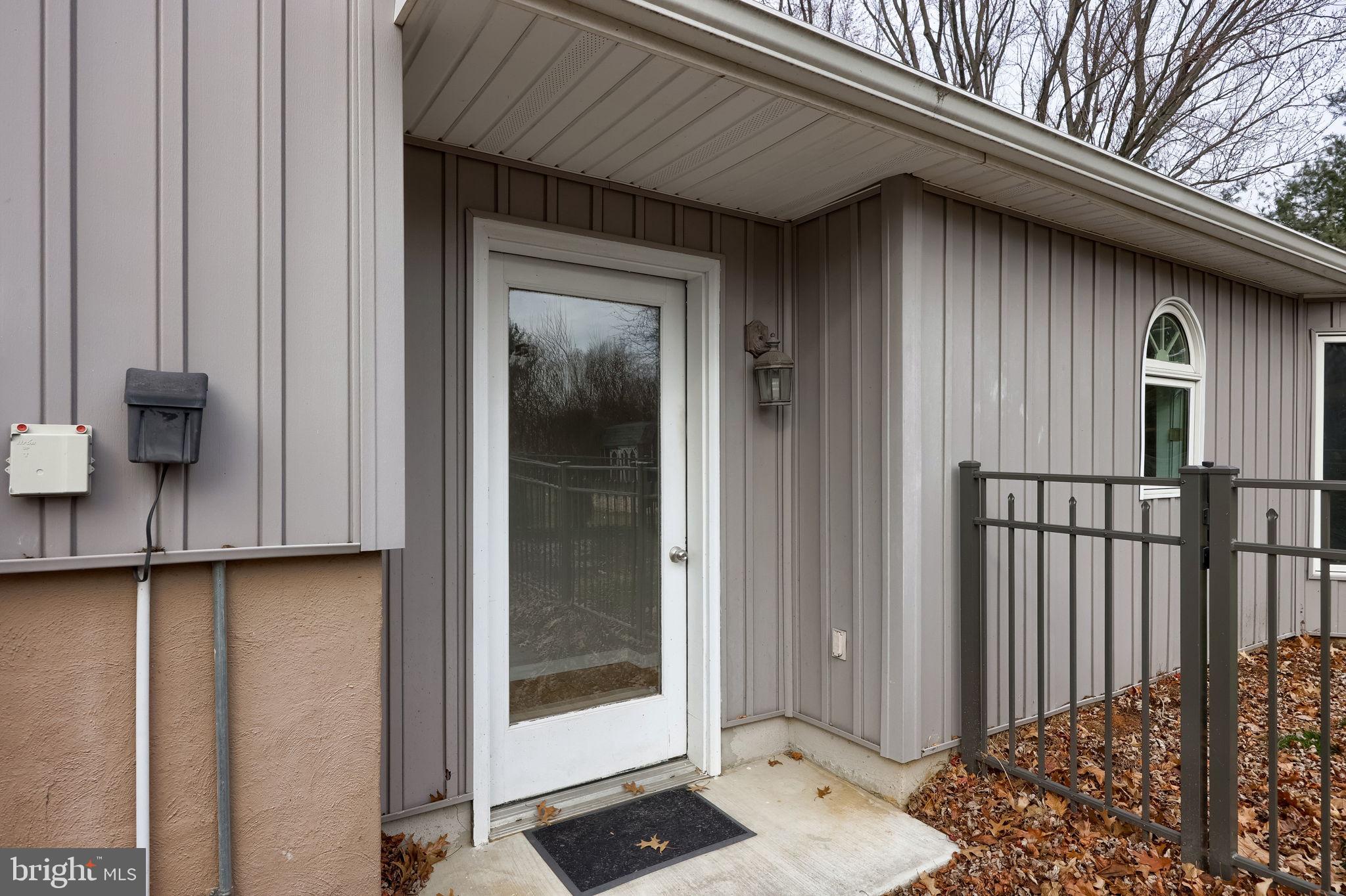421 Longmeadow Road Lancaster, PA 17601 - Photo 40 of 44 a view of a front door and a window