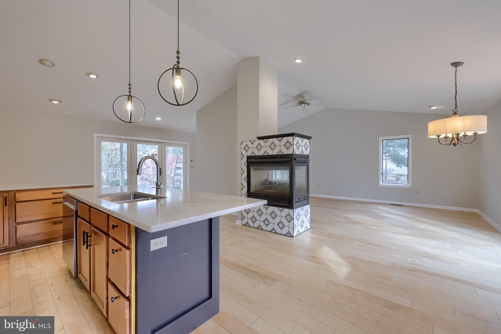 421 Longmeadow Road Lancaster, PA 17601 - Photo 7 of 44 a kitchen with stainless steel appliances granite countertop a sink a stove and a wooden floors
