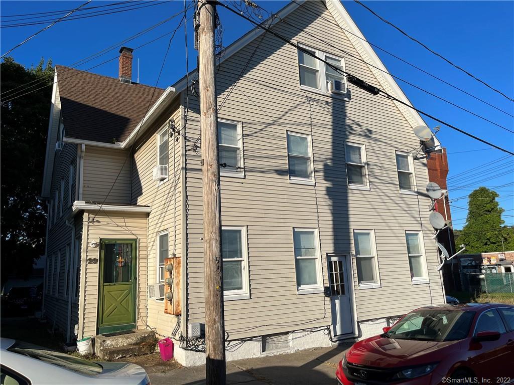 27 5th Street Norwich, CT 06360 - Photo 1 of 1 a front view of a house with patio